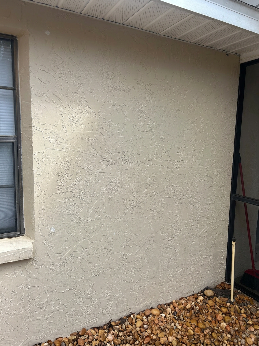 Clean stucco wall after soft washing